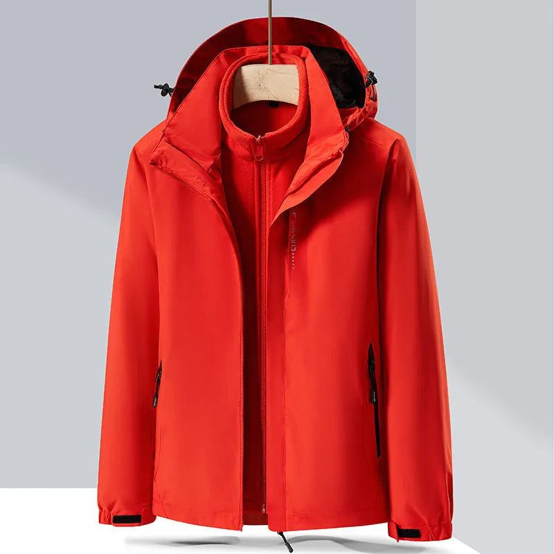Men's two-piece waterproof mountaineering suit with removable polar fleece lining in fluorescent orange