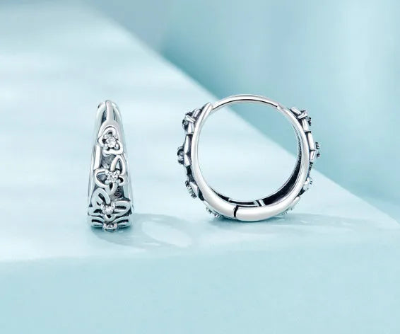 Hollow butterfly earrings in sterling silver with zircon detailing, 14mm height