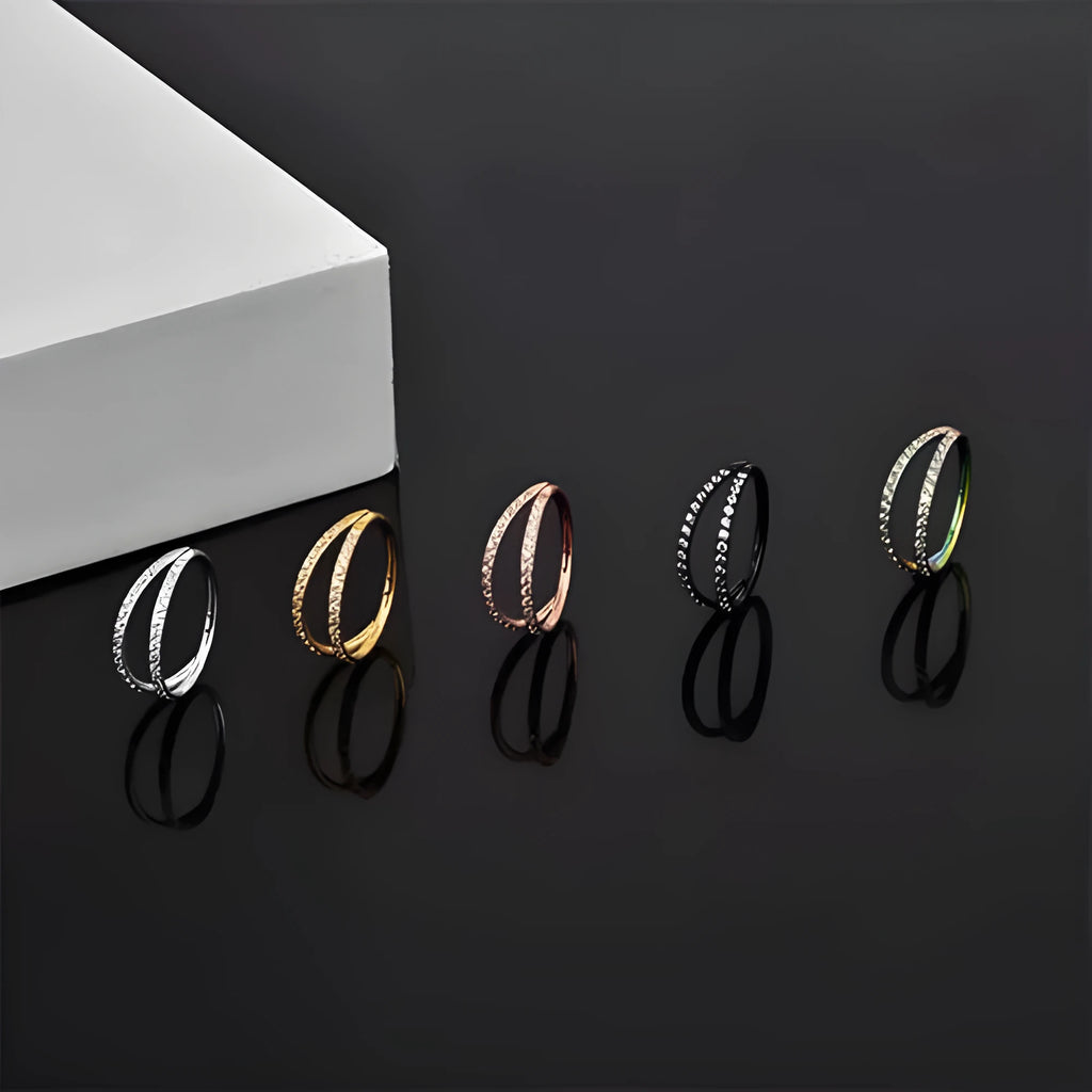 G23 titanium alloy lip and nose ring body jewellery with a zircon stud in gold or steel colour.
