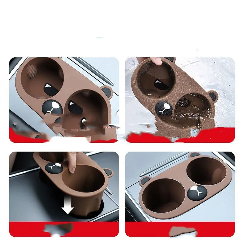 Grey silicone anti-slip insert for a car centre console cup holder.
