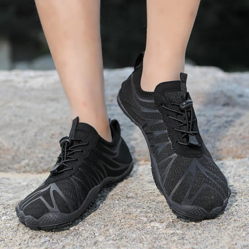 Men's and women's breathable casual sports running shoes with lace-up front and rubber sole.