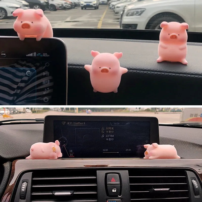 Cute cartoon pig resin figurine designed as a car dashboard decoration accessory.