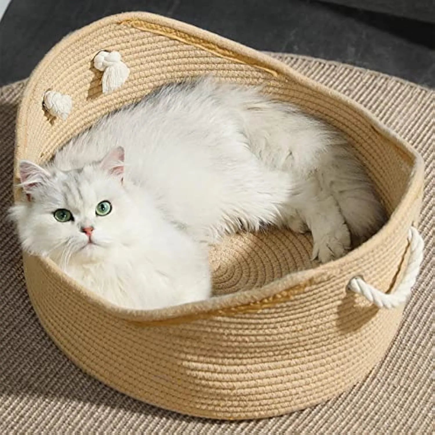Wicker cat bed basket with integrated corrugated scratching board in two size options for indoor cats