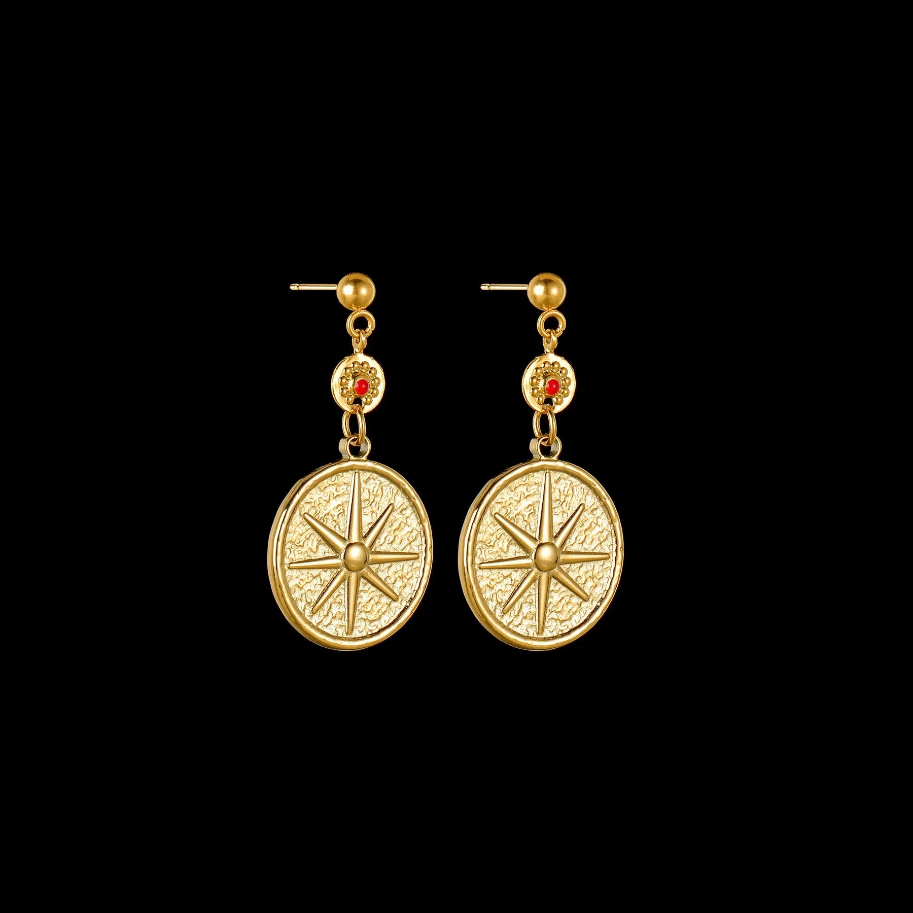 Stainless steel geometric earrings showing eight Awn XINGX, eye, and shell sun designs.