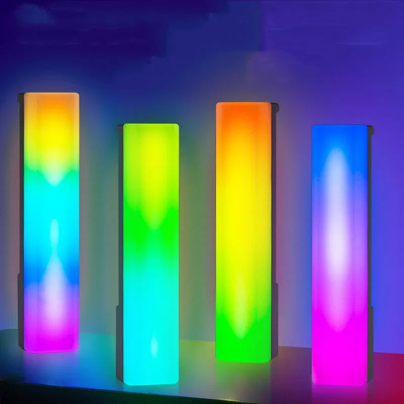 Black and white 3D RGB tabletop ambiance lamp with voice-activated rhythm lights for gaming and decor.