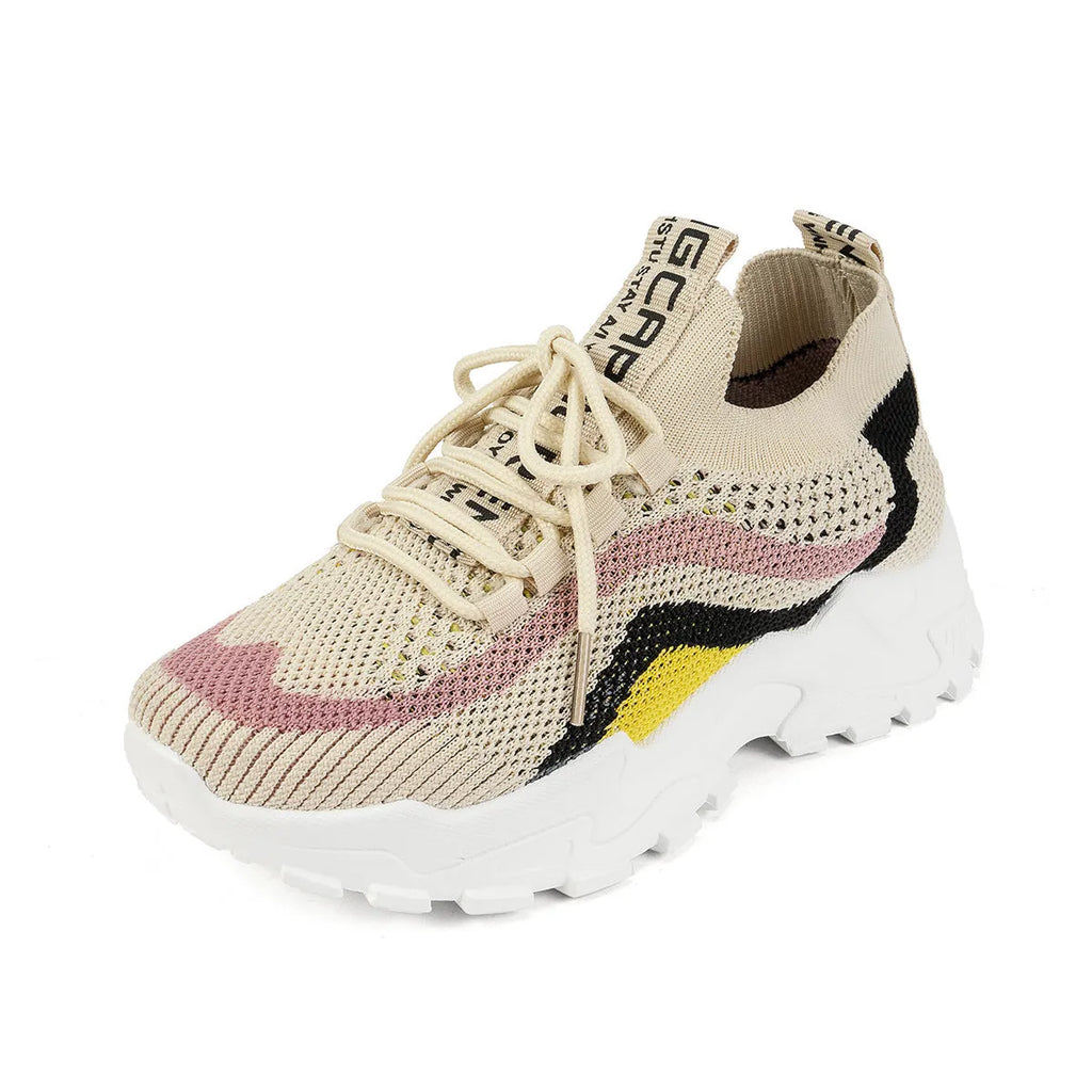 Lightweight women's casual shoes with mesh upper and soft PVC sole in black and white