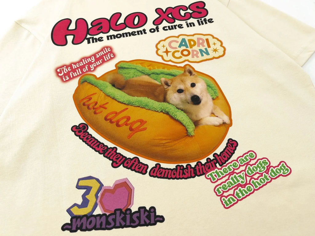 White cartoon hamburger and dog print on a loose-fit cotton T-shirt.