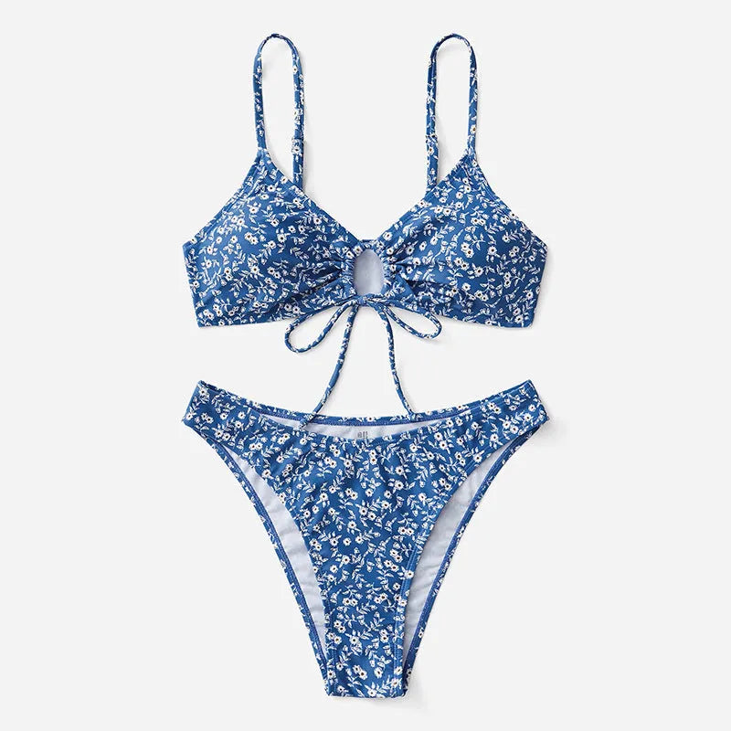 Blue polyester swimsuit three-piece set without underwire showing top and shorts separated
