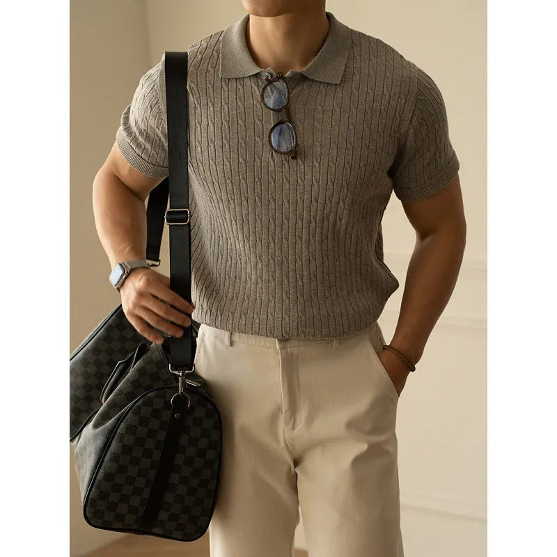 Men's khaki short sleeve business top on a hanger, showing the fabric texture and fit.