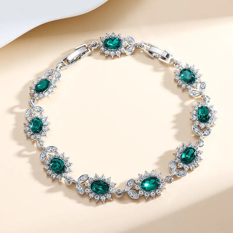 Women's bracelet with inlaid zircon gemstones in multiple colours on environmentally friendly alloy band