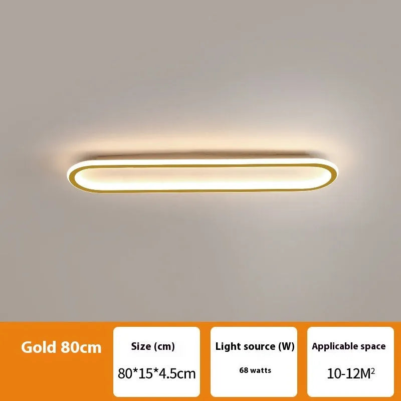 Minimalist black strip ceiling lamp with aluminium body and PVC shade mounted on a white ceiling.