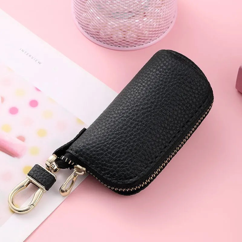 Black PU leather zipper key case showing expansion storage capacity