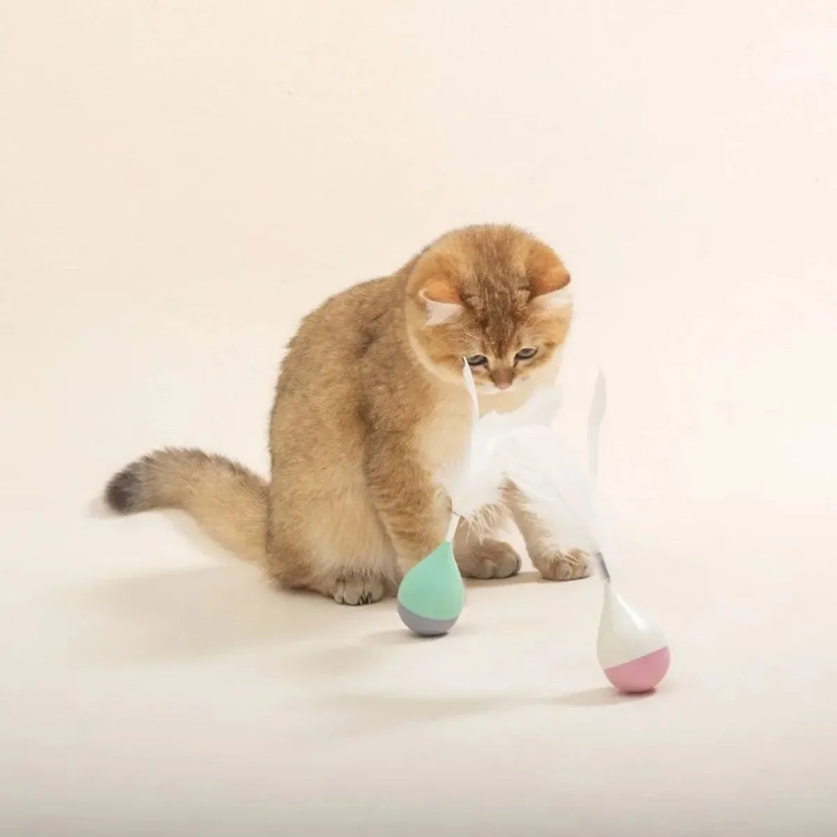 Feather tumbler cat toy with goose feather attachments on aluminium alloy rod and ABS plastic base