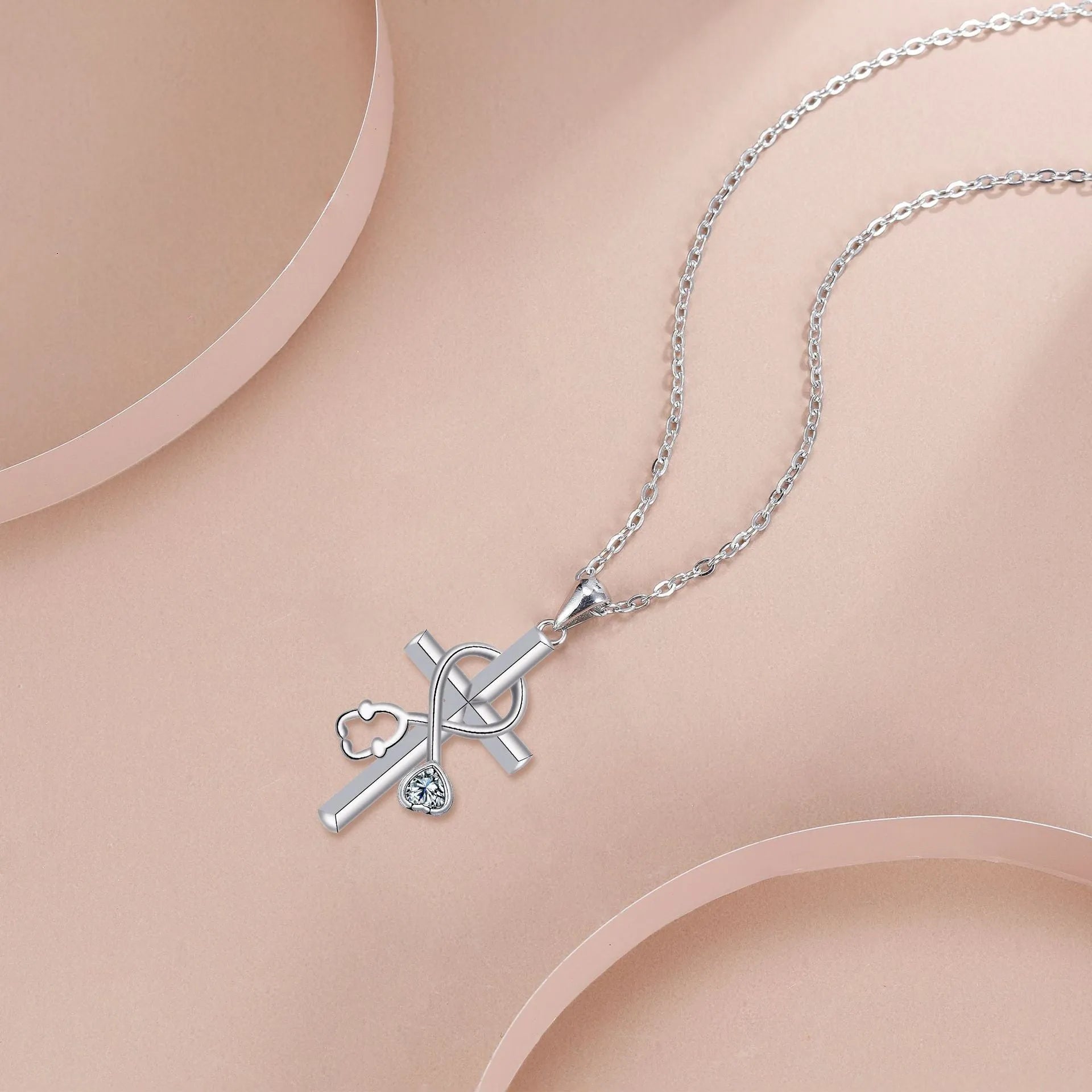 Copper electroplated stethoscope pendant necklace with cross chain design for women