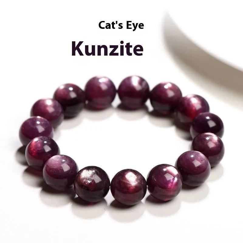 Natural purple lepidolite crystal bracelet with round polished beads on a wrist.