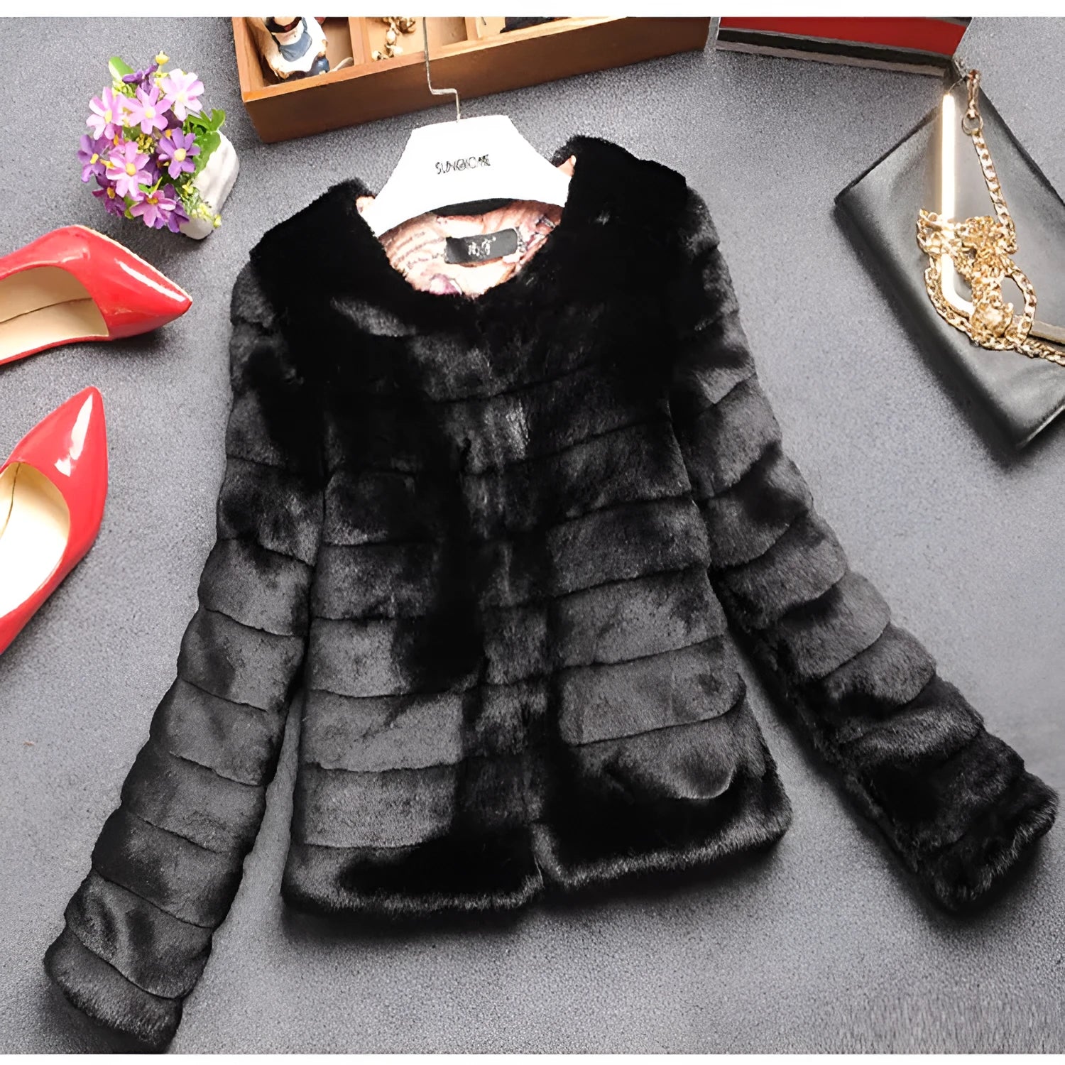 Women's faux fur top with regular sleeves in beige colour showing textured fabric