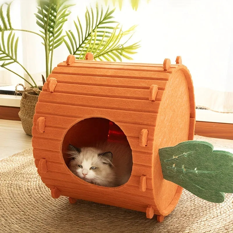 Orange carrot-shaped cat tunnel bed made of felt, showing its semi-enclosed design and entrance.