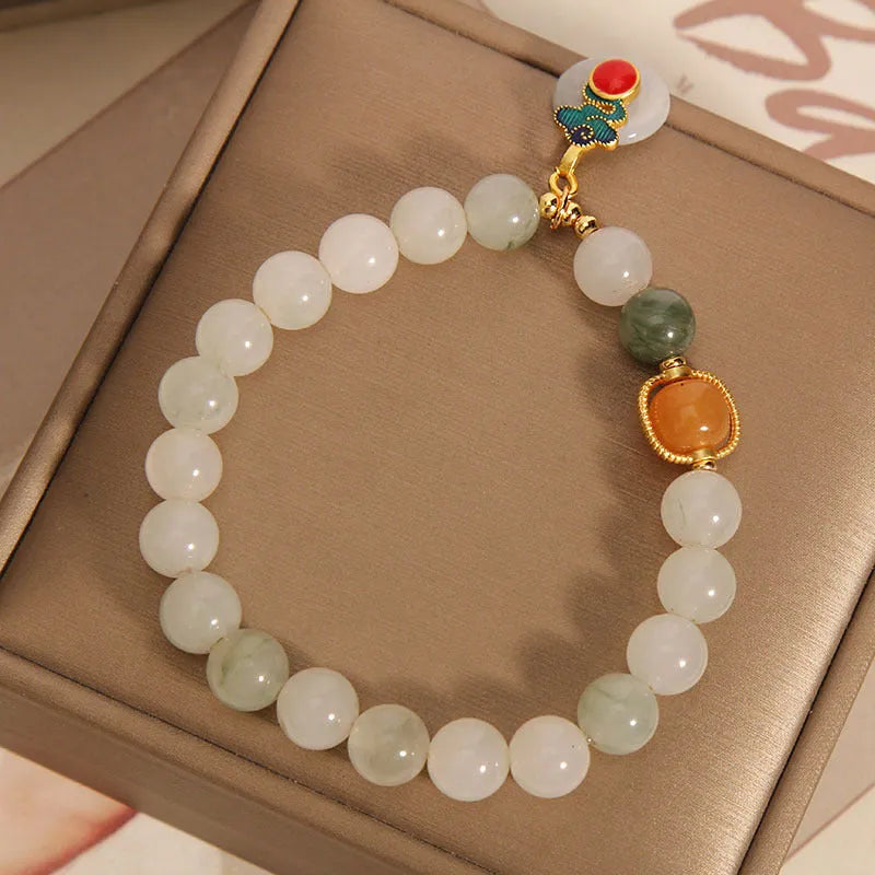 Ice jade women's bracelet with Xiangyun peace buckle and pearl decorative elements