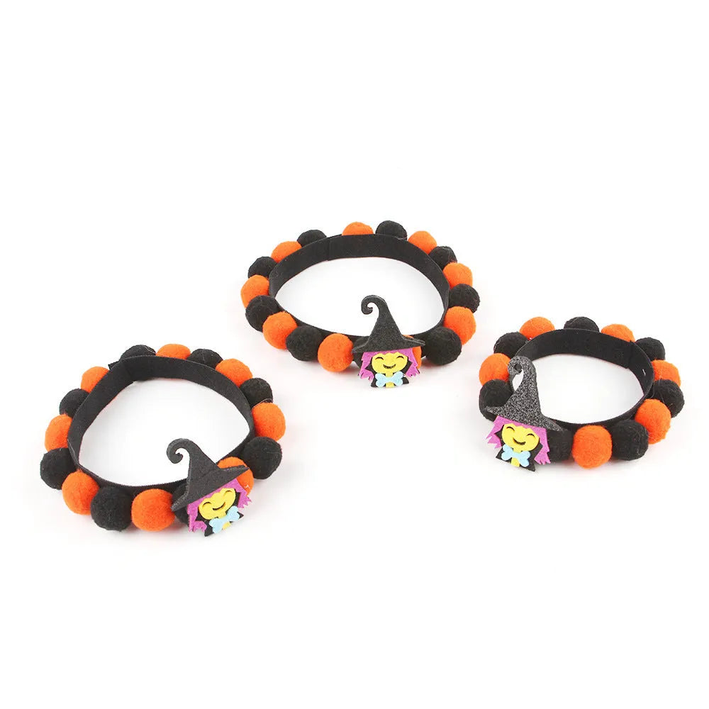 Halloween pet collar with fluffy fur ball accessory in pumpkin design, shown in size M