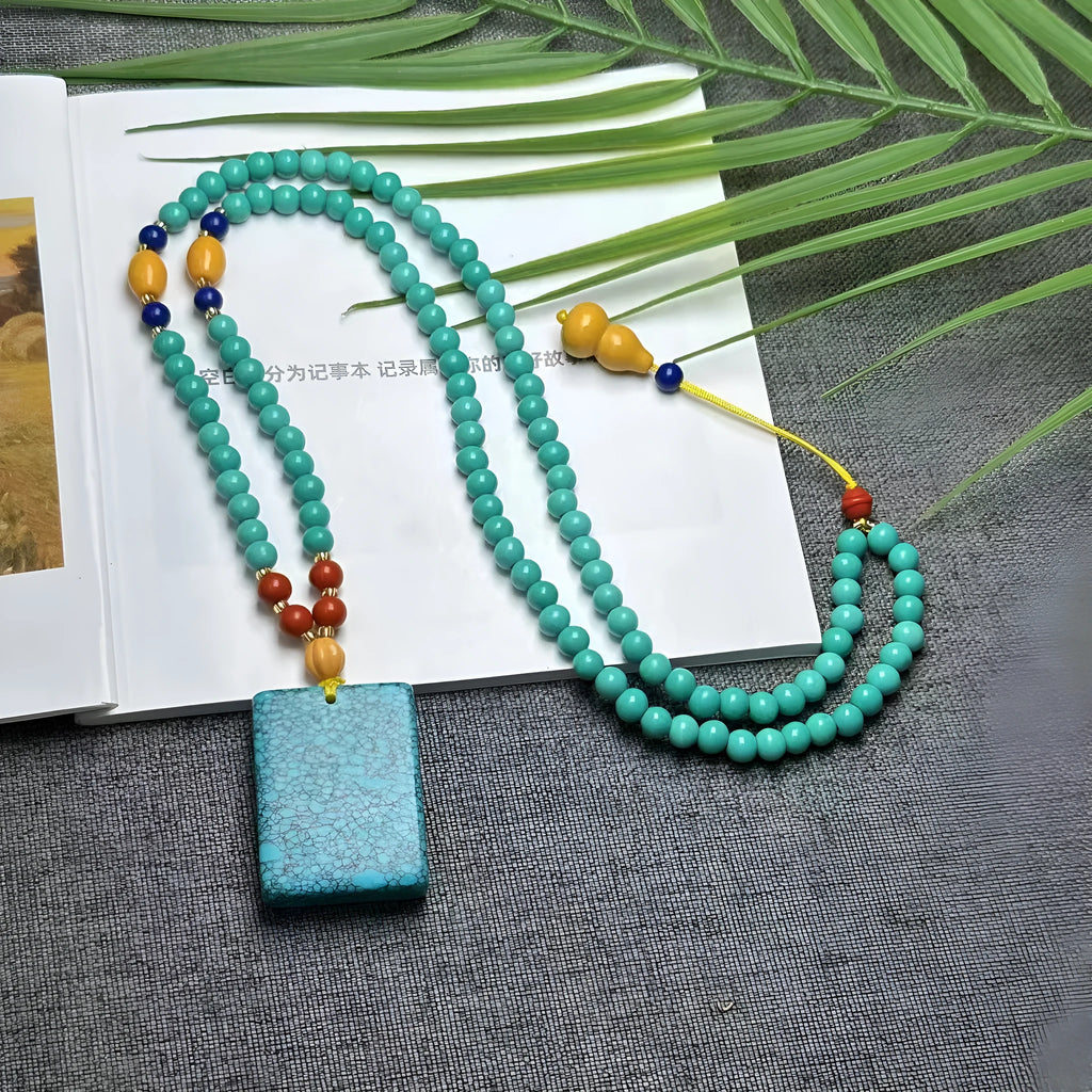 Turquoise mesh flower pendant necklace on adjustable ball bead chain