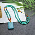 Turquoise mesh flower pendant necklace on adjustable ball bead chain