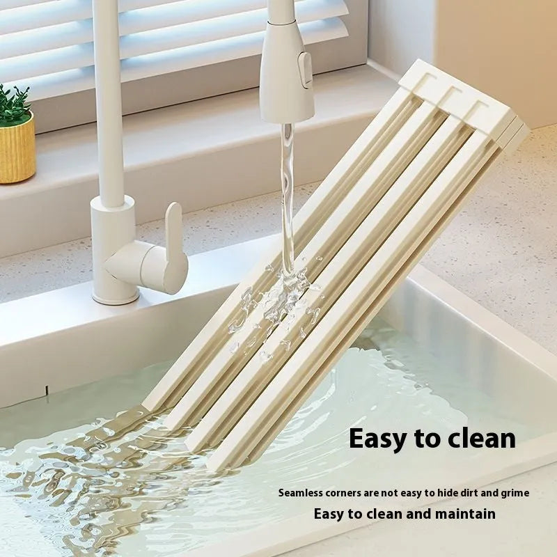 Foldable milky white stainless steel kitchen draining rack shown open and collapsed.