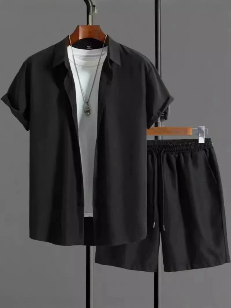 Men's jacquard short sleeve suit set in black with matching shorts, showing front view
