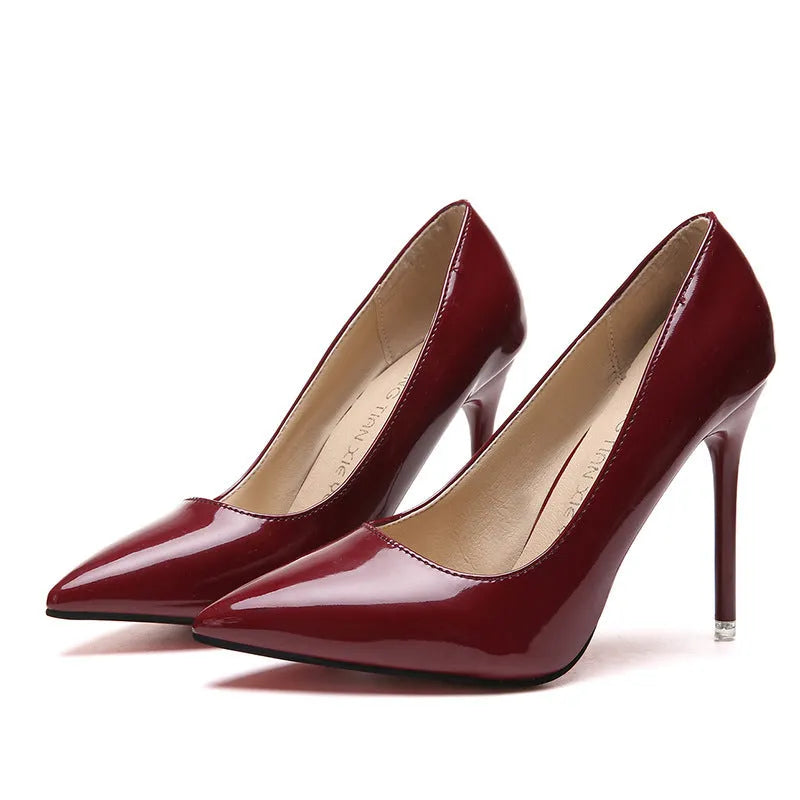 Women's pointed toe stiletto high heel pump in apricot colour with super high heel.