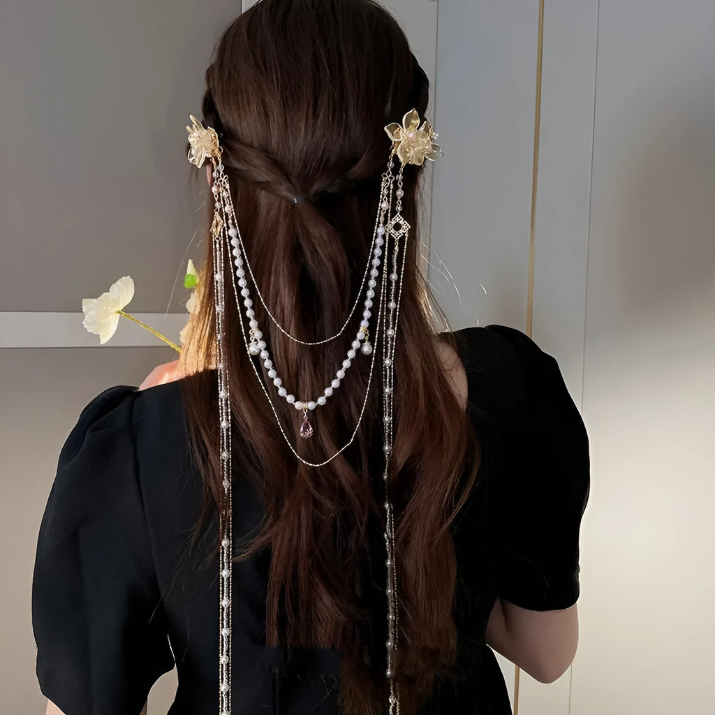 Gold women's hairpin with pearl, diamond and tassel decorative elements