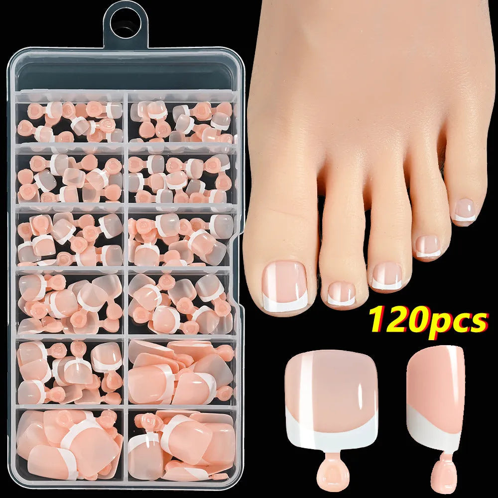 120-piece box of French white tip false toenails in nude colours, square short shape.
