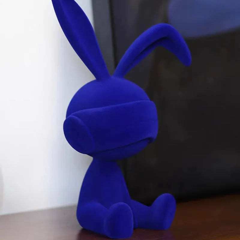 Blue resin rabbit table ornament with suede blindfold decorative detail