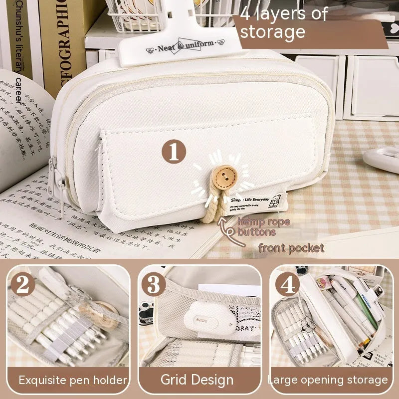 Large Korean-style canvas pencil case for girls in green, holding multiple pens.