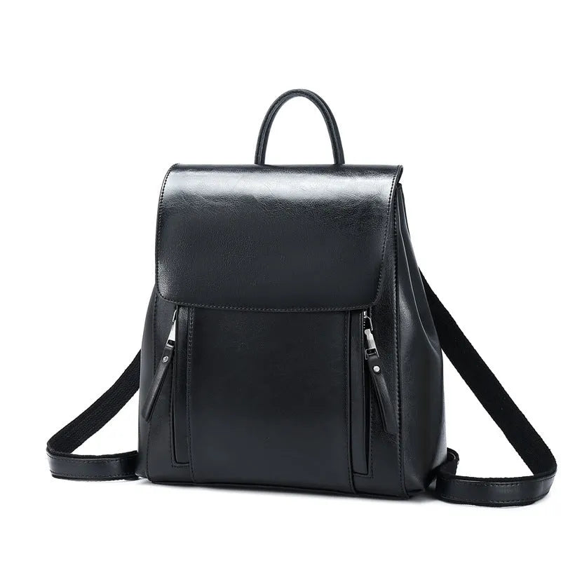 Genuine leather women's backpack in black with multiple compartments and dual shoulder straps
