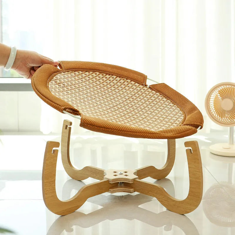 Brown woven rattan pet hammock bed measuring 46x46cm with a 17.5cm high frame