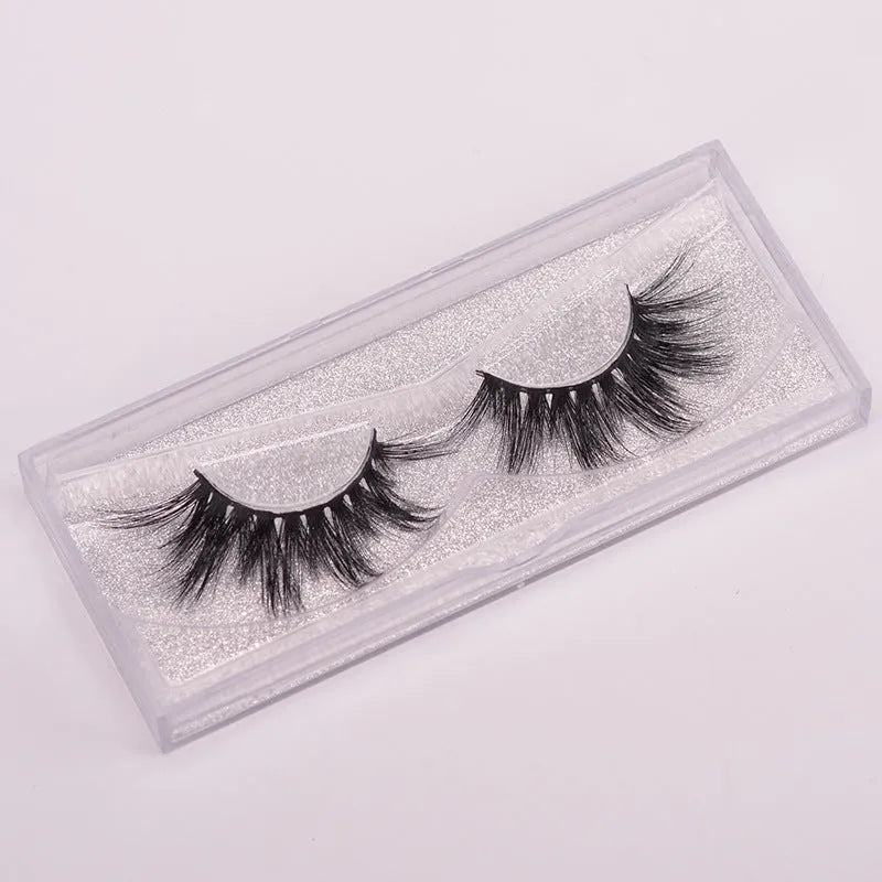 Affectionate brand 5D false eyelashes made from natural mink hair, shown with a dual-ended brush and a black hair cap.