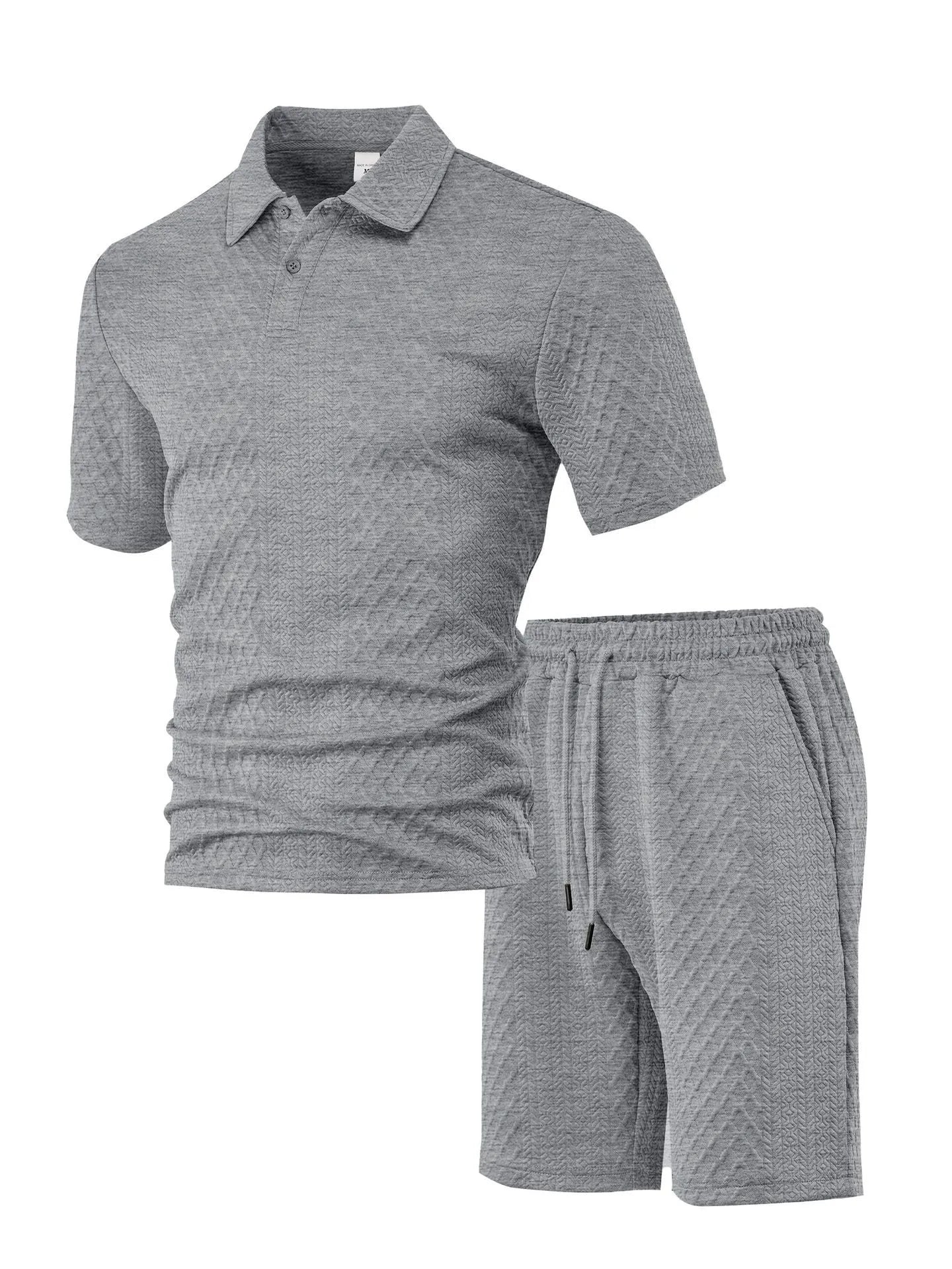 Men's patterned cloth casual suit comprising a short sleeve polo shirt and trousers on a hanger.