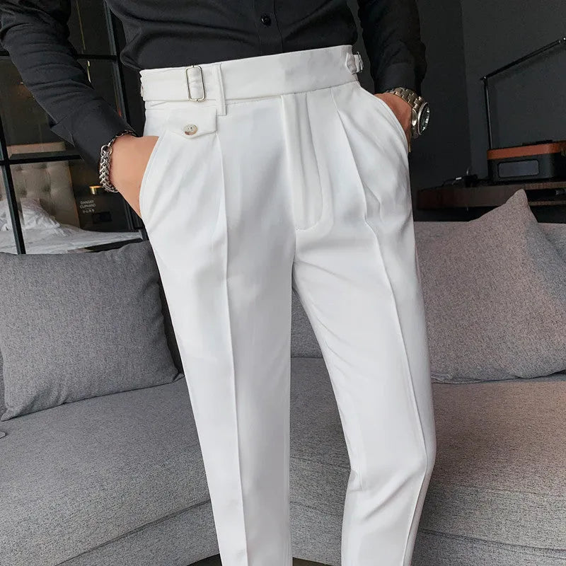 Straight-leg casual trousers in solid colour on hanger showing waistband and leg detail