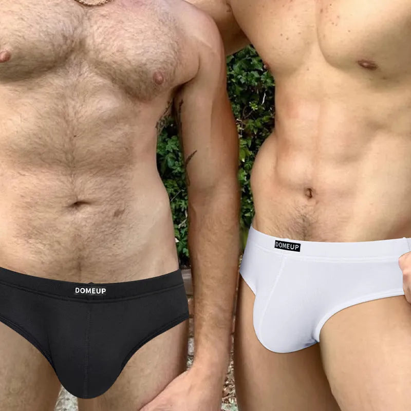 Men's solid colour low-waist briefs in seamless breathable polyester fabric