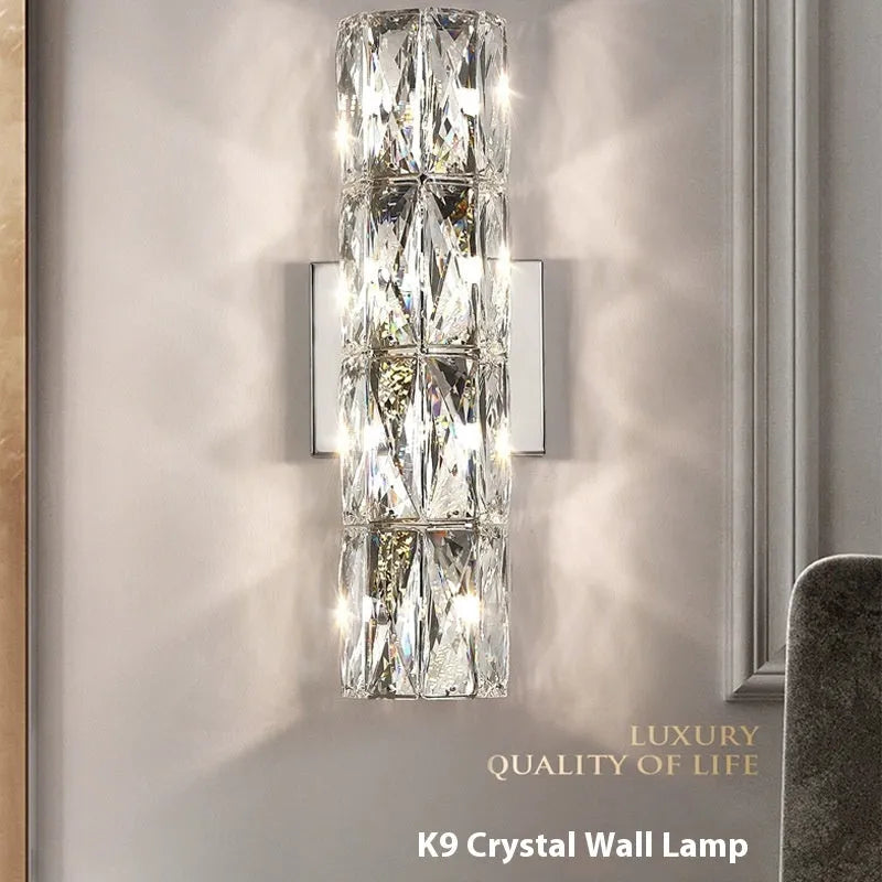 Crystal wall lamp with metallic finish and LED tri-colour lighting in multiple size options
