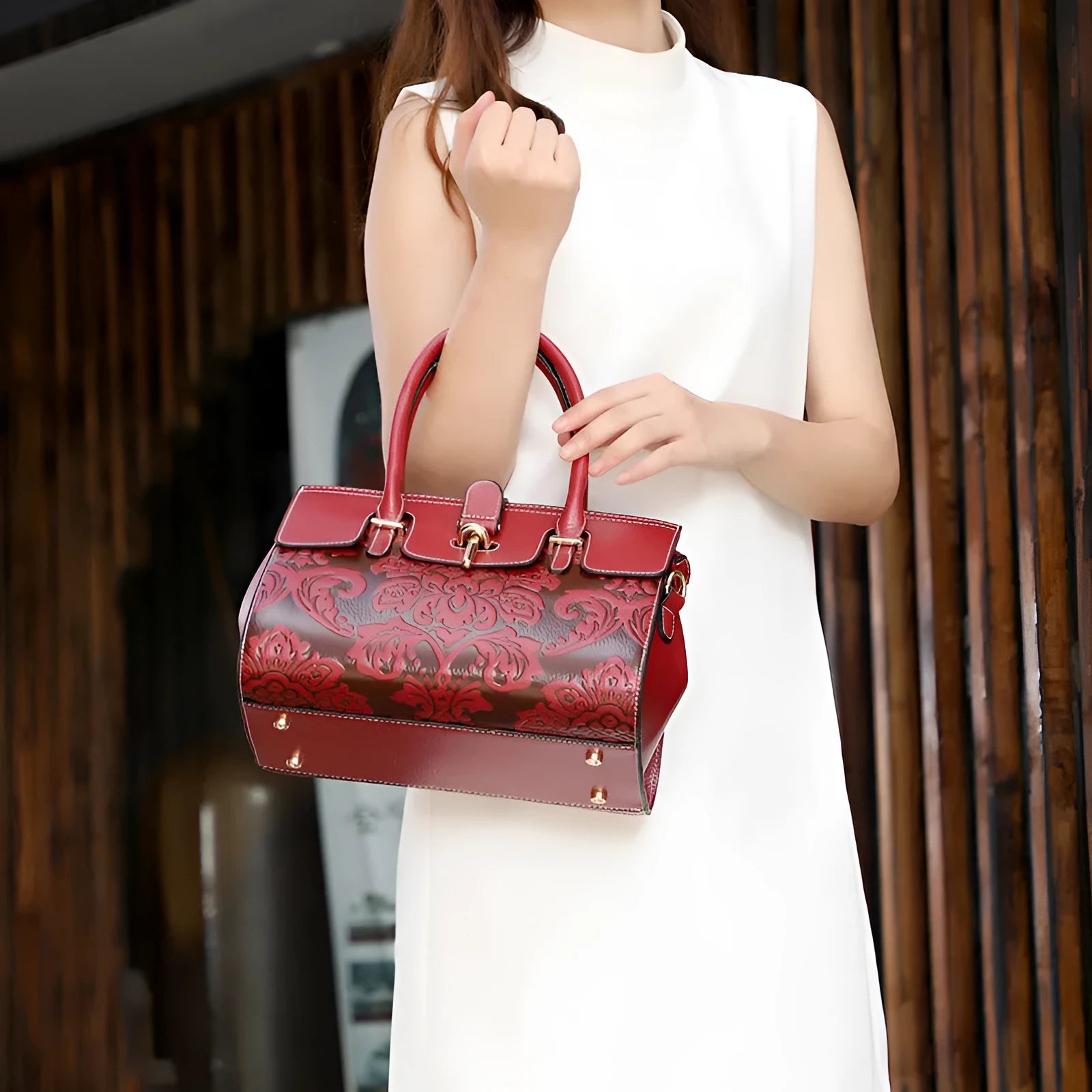 Oval vintage embossed genuine leather crossbody bag showing internal compartments