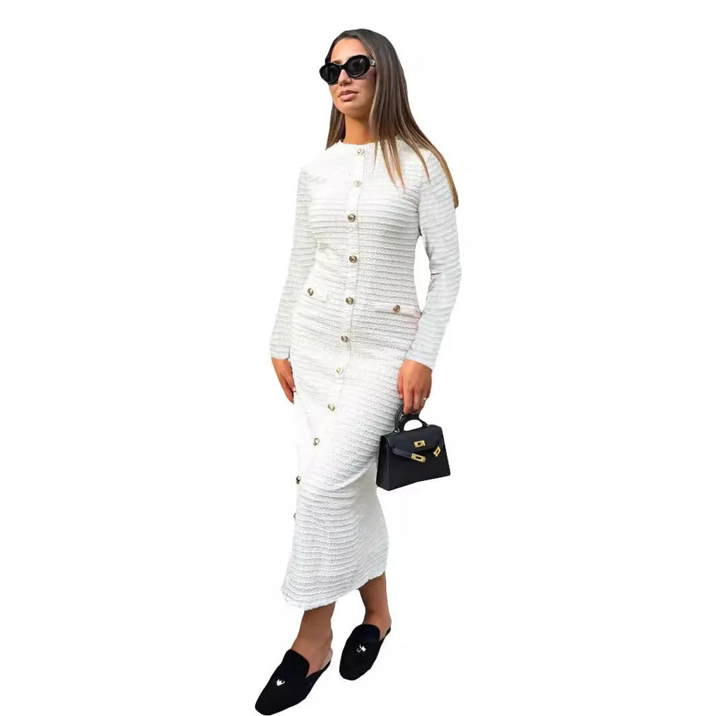 Black retro slim fit knitted long-sleeved dress with button detailing and a mid waist.