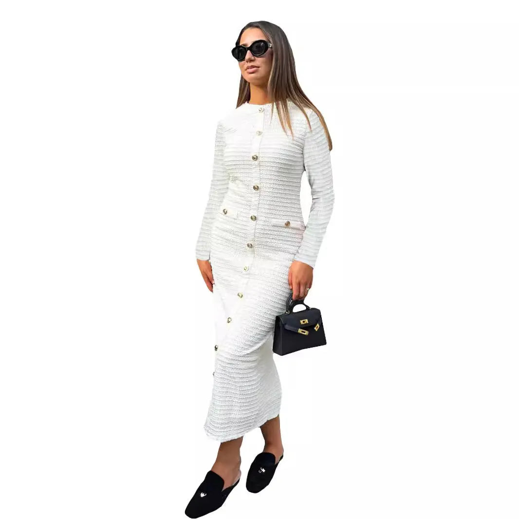 Black retro slim fit knitted long-sleeved dress with button detailing and a mid waist.
