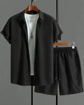 Men's jacquard short sleeve suit set in black with matching shorts, showing front view