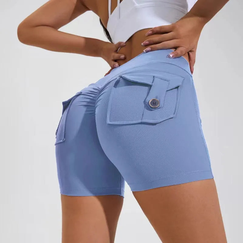Women's high waist hip lifting sports shorts with side pockets in electric blue colour