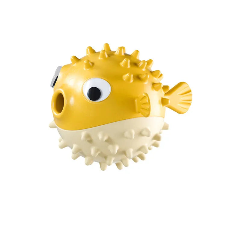 Green fish-shaped interactive dog toy with textured surface for medium and large dogs