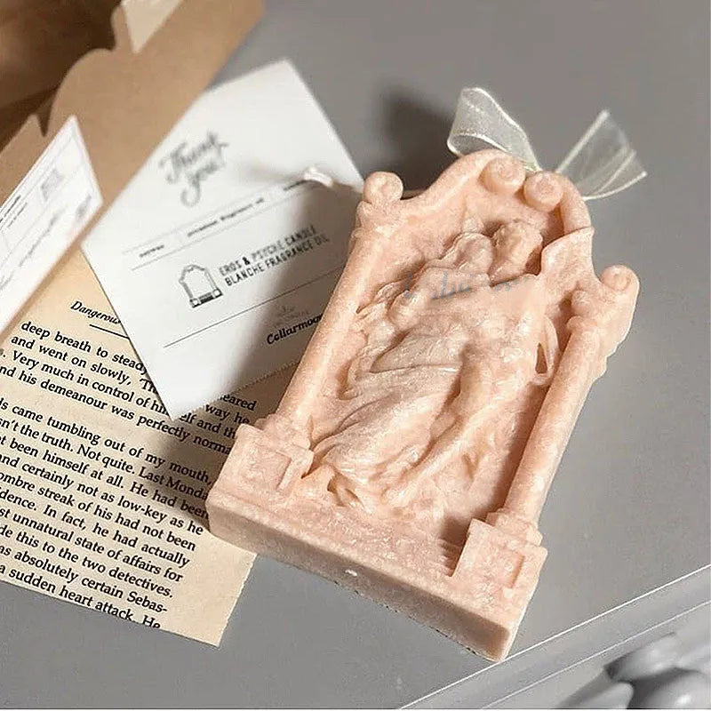 Detailed silicone mould showing an Ancient Greek couple angel design for baking and crafts.