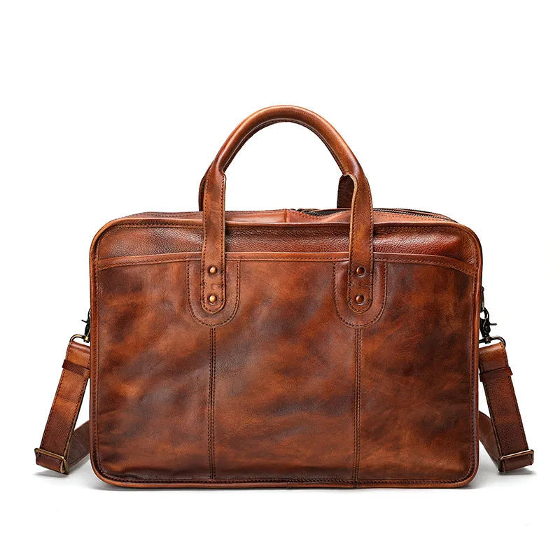 Men's vintage leather briefcase in black showing internal organisation pockets and 42cm width
