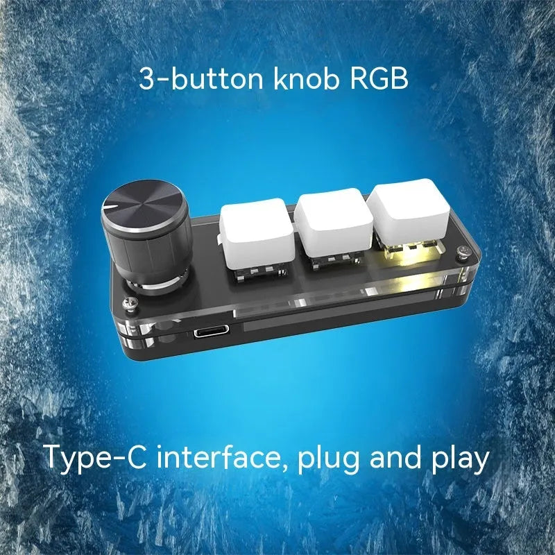 Black programmable mini keyboard with RGB backlit keys showing copy and paste shortcuts