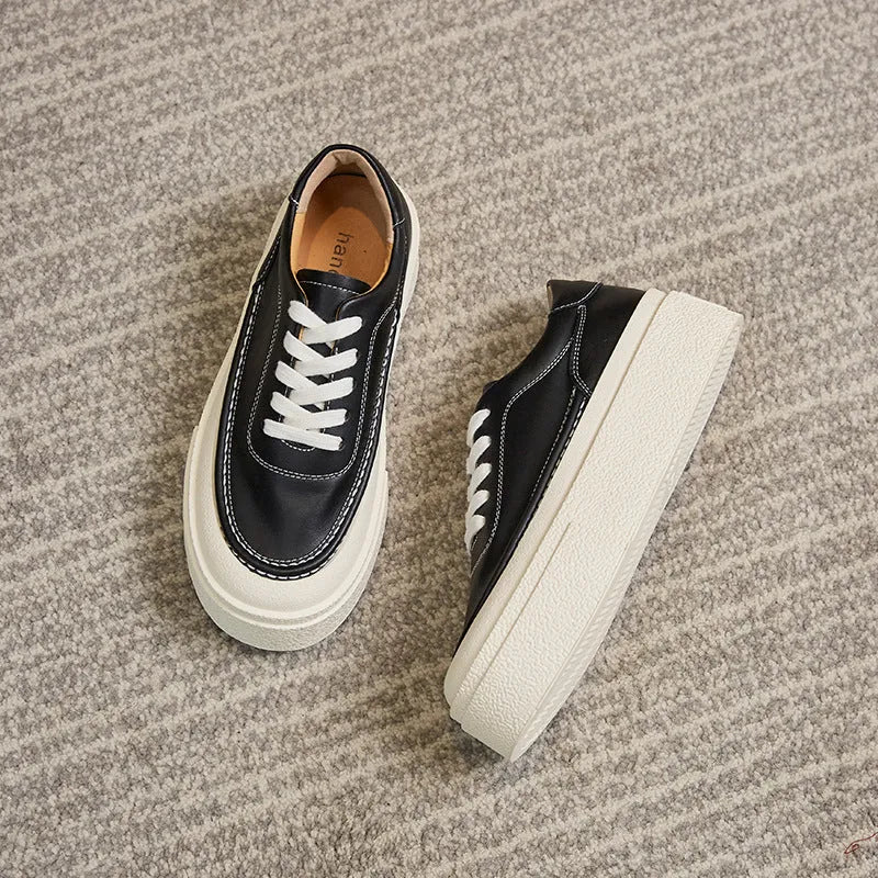 Women's black platform sports board shoes with cowhide leather upper and round toe design