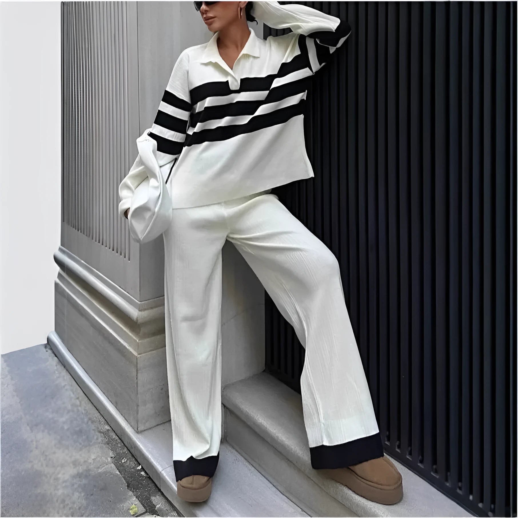 Women's black and white striped knitted polo collar two-piece set with long sleeve top and trousers